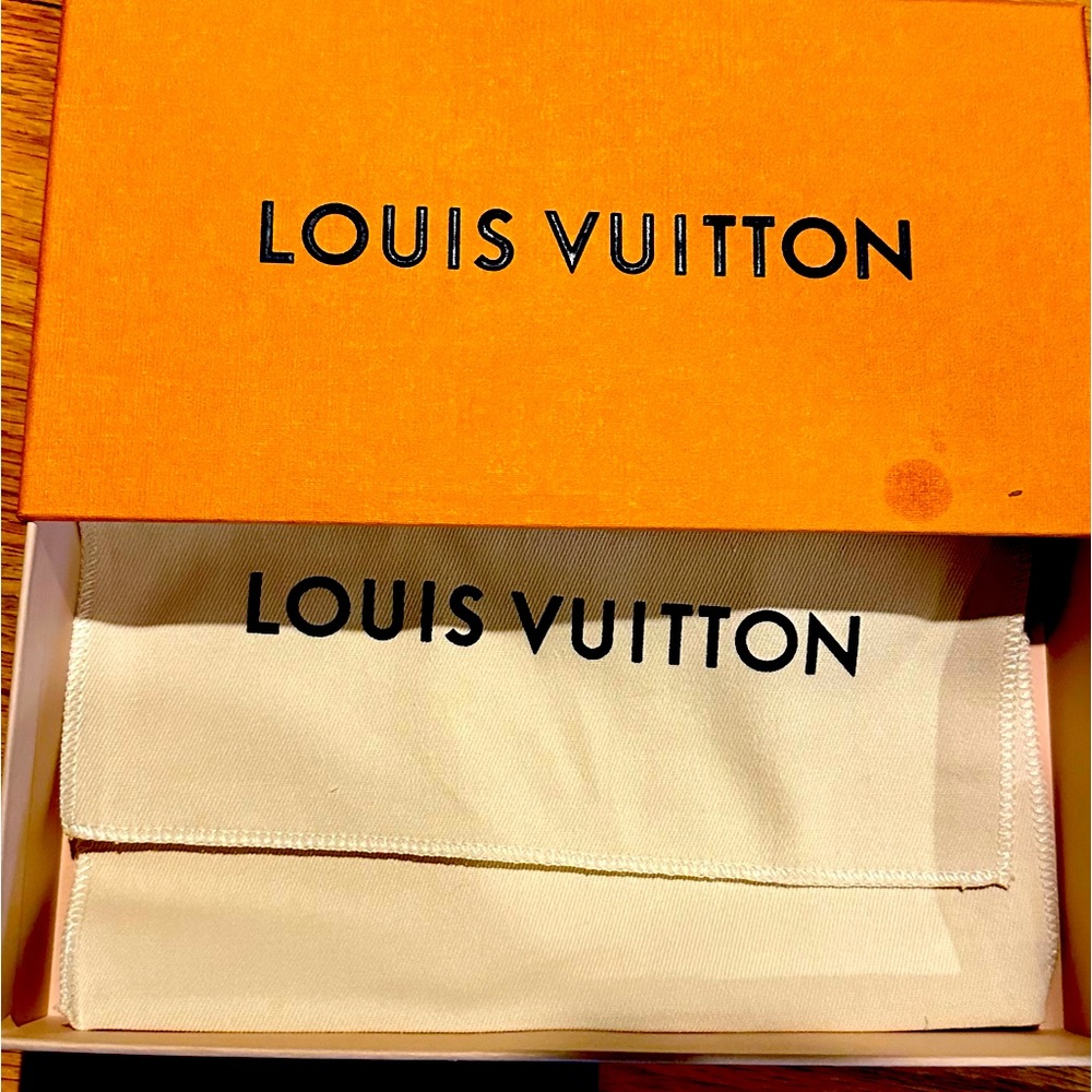 Empty Louis Vuitton wallet box and dust bag.